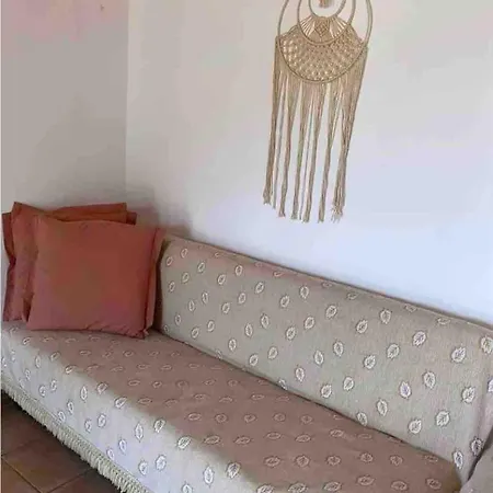 Tania House , Loggos Paxos Longós