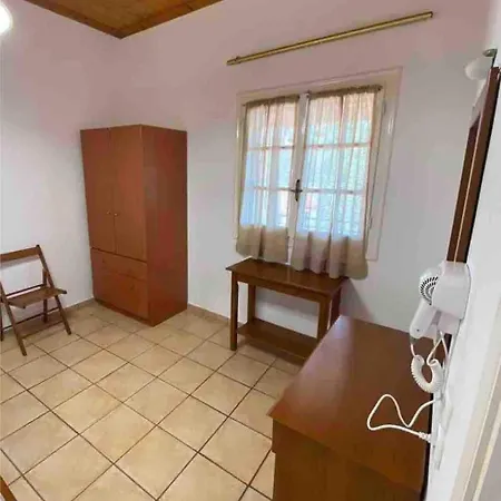 Tania House , Loggos Paxos