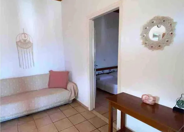 Tania House , Loggos Paxos * Longós